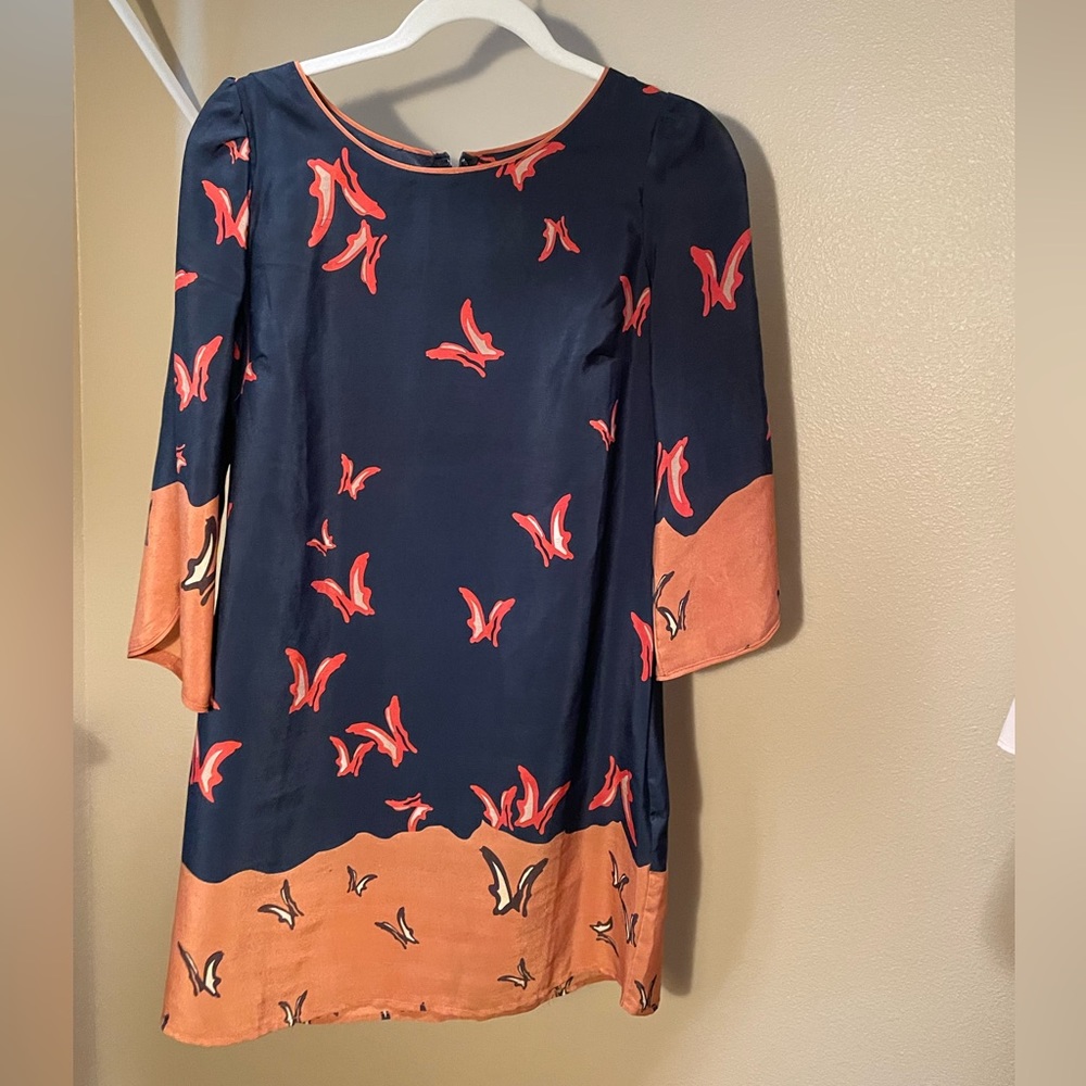 Mid-century vibes mini dress with long sleeves. Size small.